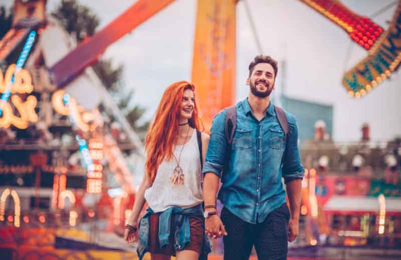 Couple at an amusement park