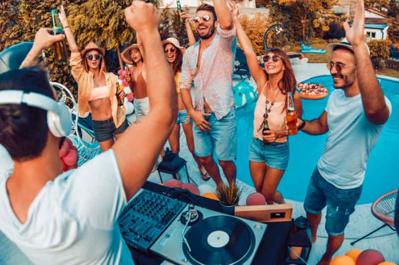 DJ playing music at a pool party