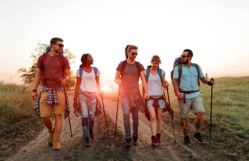 Five friends hiking together