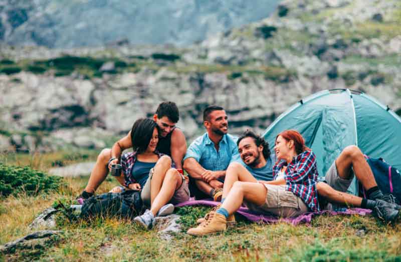 Friends camping in the mountains