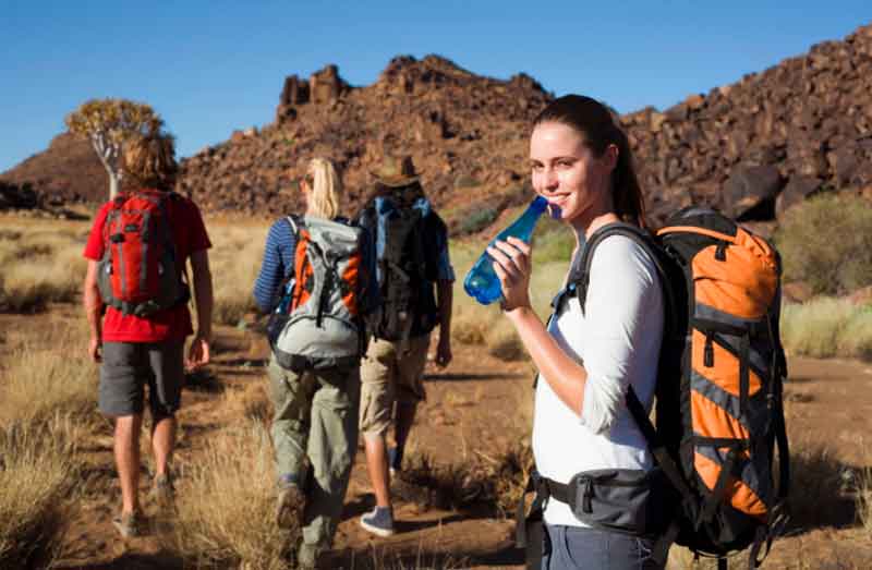 Girl hiking with her friends