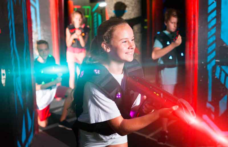 Kids Having Fun Playing Laser Tag