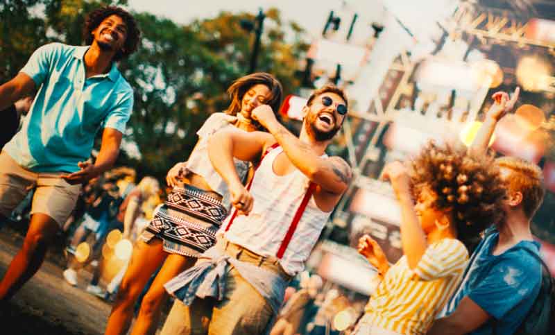 People dancing at a festival