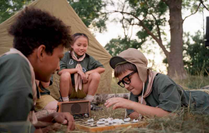 14-year-olds having a board game party