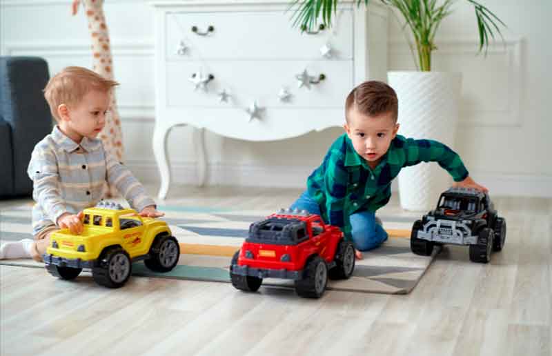 3-year-olds playing with cars