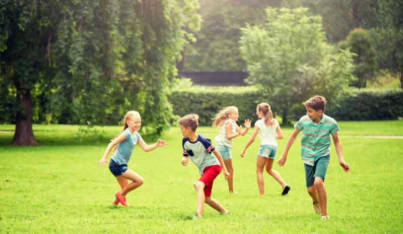 6-year-olds playing outdoors