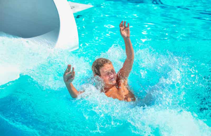 Boy Swimming at Pool