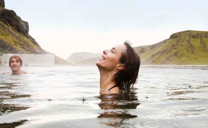 Girl enjoying hot springs
