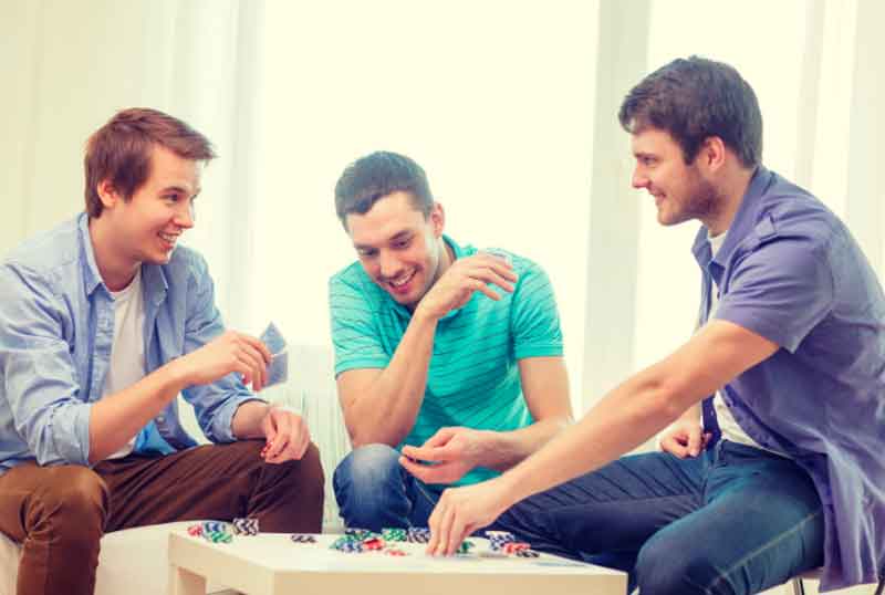 Guys playing poker