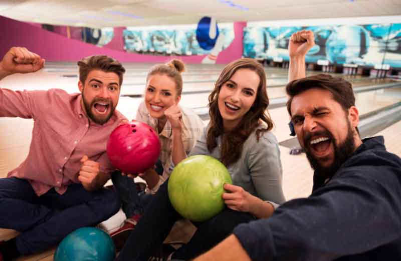 Having fun at the bowling alley