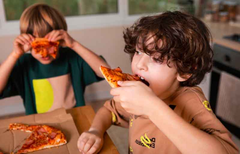 Kids at a Pizza Party