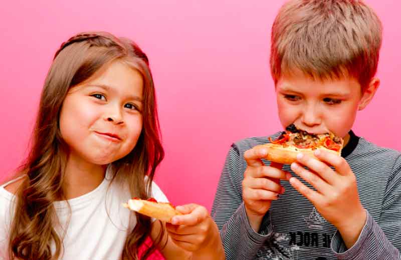 Kids enjoying a pizza party