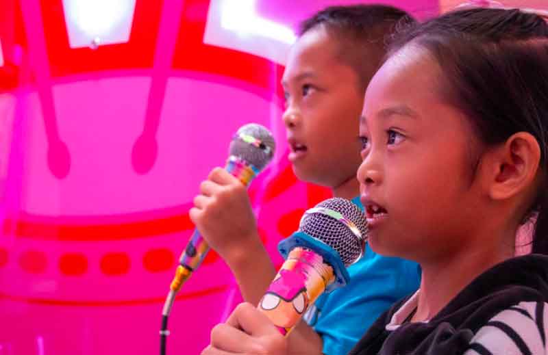 Kids having a karaoke contest