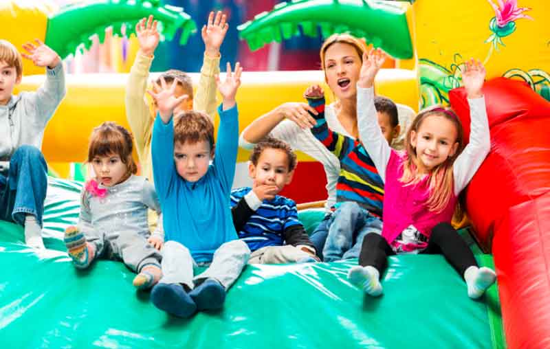 Kids in a bounce house