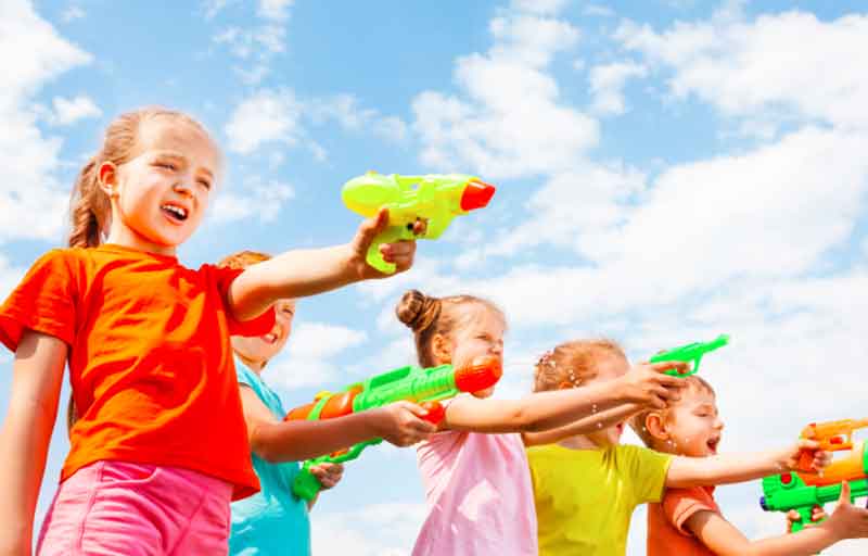 Kids playing with water toys