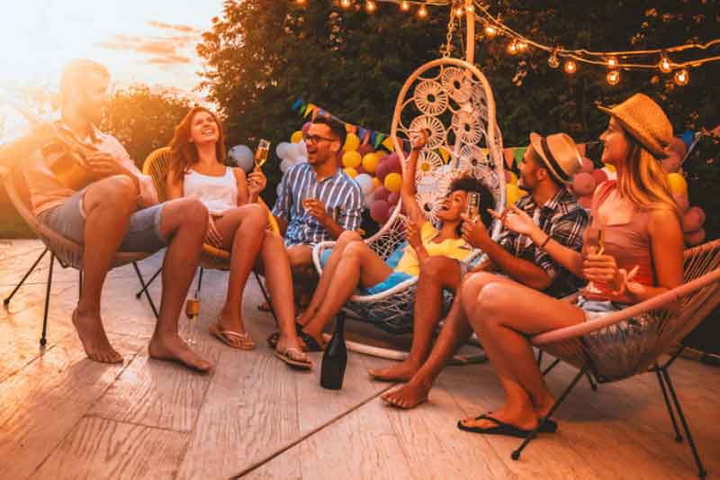 Man plays guitar for his friends