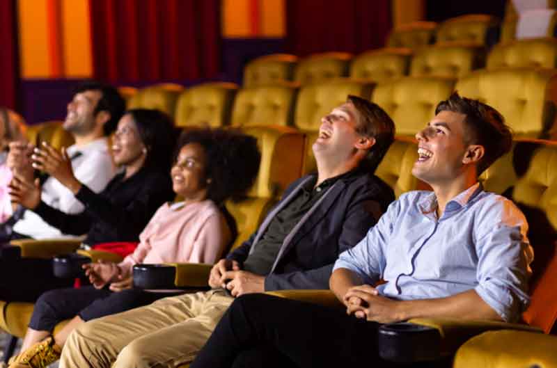 People laughing at a comedy club