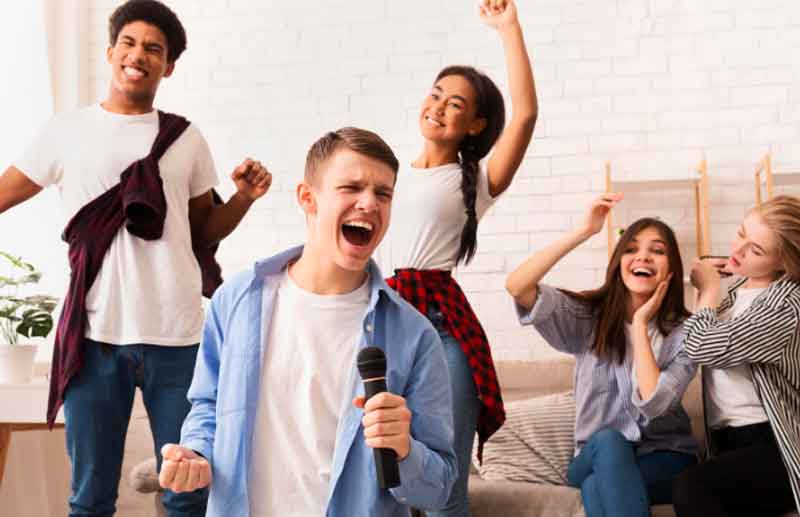 Teenagers Singing and Having Fun