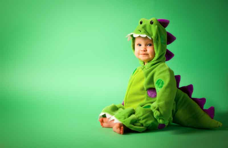 1-year-old in a dinosaur costume