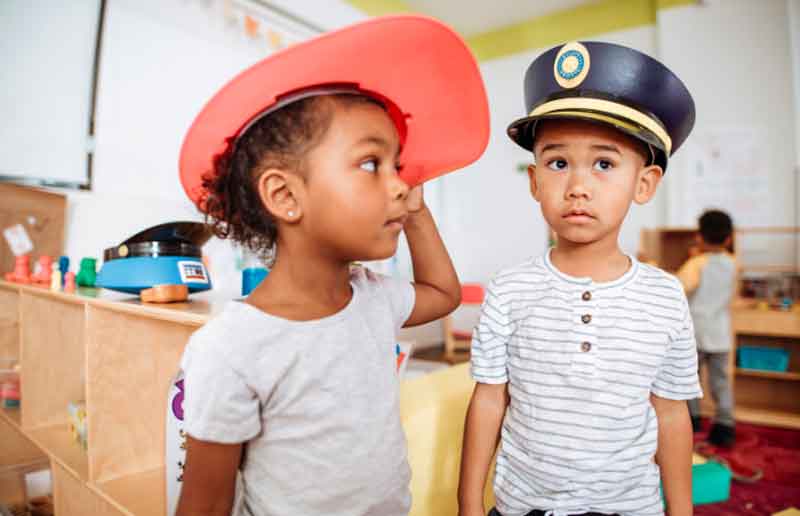 Kids wearing hats at a party