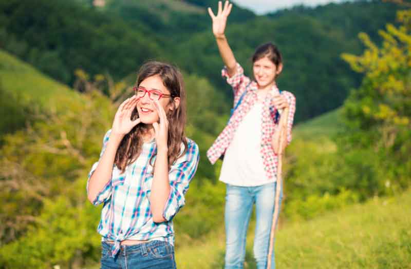 Teenage girls hiking