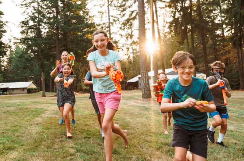 Teens having a nerf battle